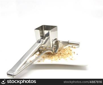 Grater with hazelnuts