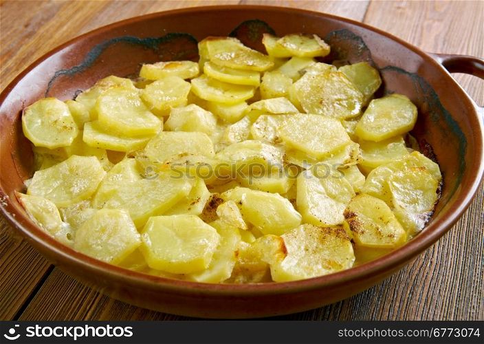 Gratin dauphinois - traditional regional French dish.