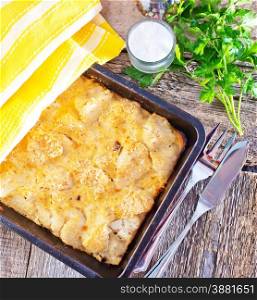 gratin with potato and cheese on the plate