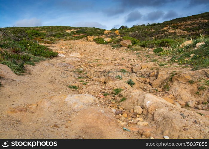 gravel path into the sky. path in a hill toward the sky.