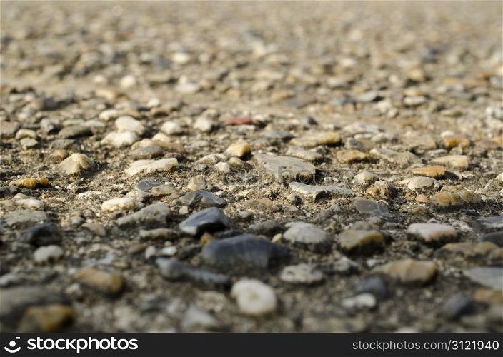 Gravel street macro background. Detail macro view on the structure of a gravel path or street, background structure