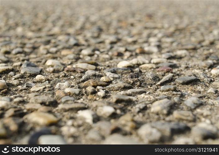 Gravel street macro background. Detail macro view on the structure of a gravel path or street, background structure