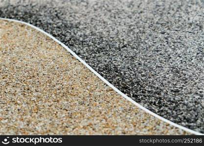 gravel surface texture background, two difference color, dark and gold, yin-yang concept