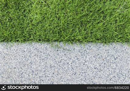 Gravel texture and strip grass as background