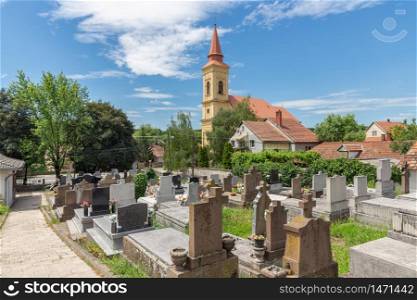 Graveyard with church in Szomolya near Eger, Hungary. Graveyard with church in Szomolya near Eger in Hungary