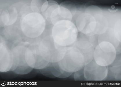 gray abstract bokeh background from nature environment. white blur abstract. Christmas lights