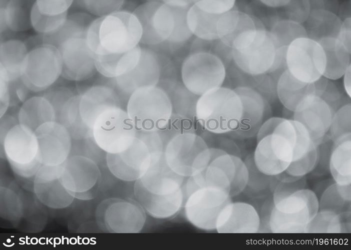 gray abstract bokeh background from nature environment. white blur abstract. Christmas lights