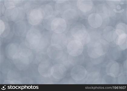 gray abstract bokeh background from nature environment. white blur abstract. Christmas lights