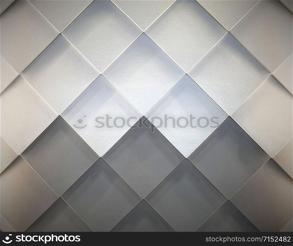 Gray and white tiles arranged on the wall in diagonal rectangular pattern.