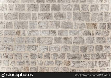 Gray brick background, grunge style brickwork wall, stylish modern architecture detail, building exterior, stonewall texture