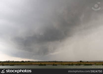 Gray clouds on a stormy day. Gray clouds on a stormy day containing loads of rain