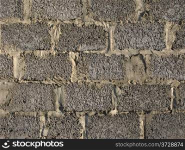 Gray concrete blocks wall, useful as background