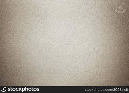 Gray concrete wall with decorative stucco pattern background photo texture with vignette shadow effect