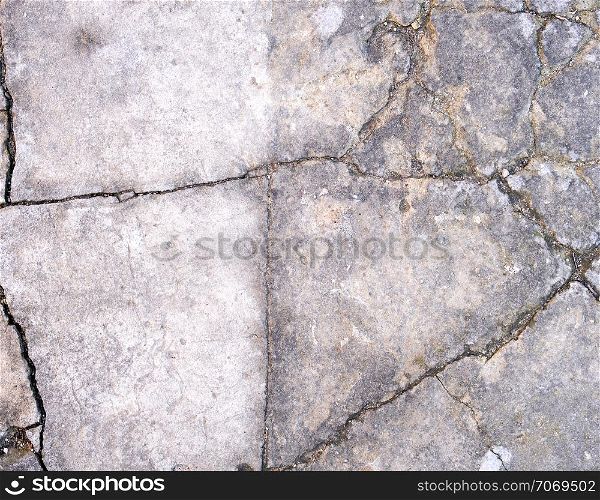 gray cracked cement, full frame, close up