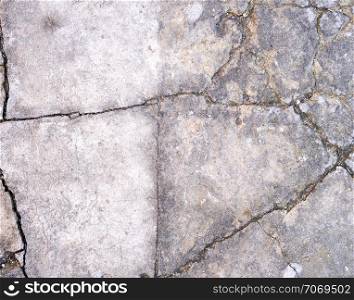 gray cracked cement, full frame, close up