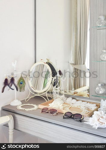 gray dressing table with accessories at home