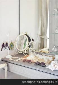 gray dressing table with accessories at home