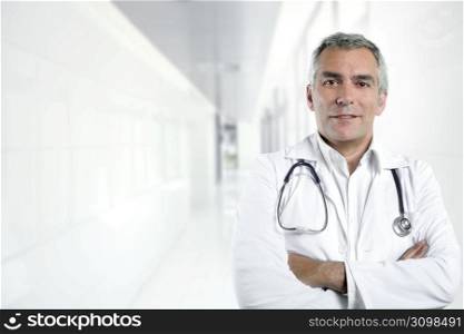 gray hair expertise handsome senior doctor hospital portrait white corridor