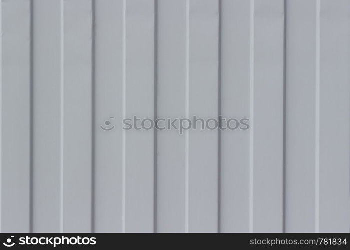 Gray metal corrugated sheet as background and texture.