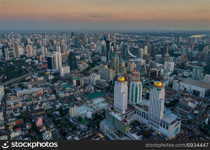 gray metropolis with tall skyscrapers - picture of Bangkok from a tall skyscraper