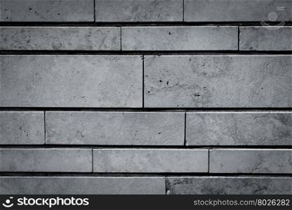 Gray stone wall closeup background of photo texture