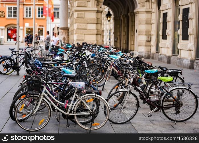 Graz, Styria,Austria - 24.06.2020: View at bikes parkes at main square next to city hall.. View at main square in Graz city, Austria