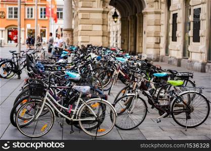 Graz, Styria,Austria - 24.06.2020: View at bikes parkes at main square next to city hall.. View at main square in Graz city, Austria