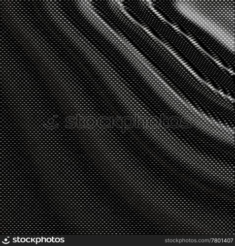 great black woven carbon fibre background texture. carbon fibre