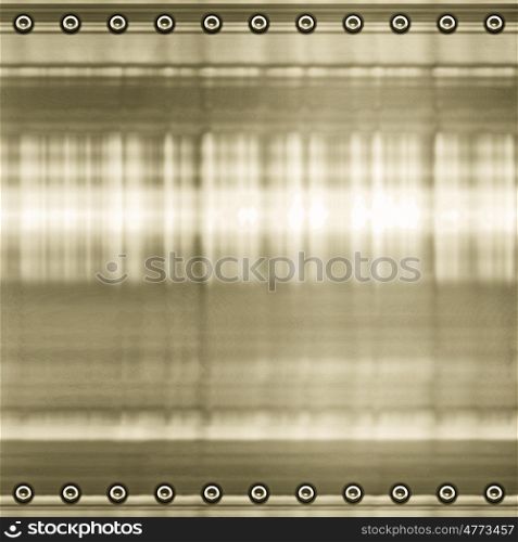 great gold metal background texture with screws