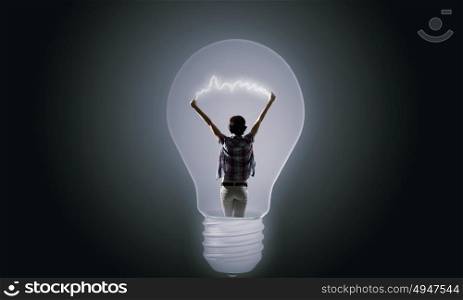 Great idea. Back view of girl inside of light bulb