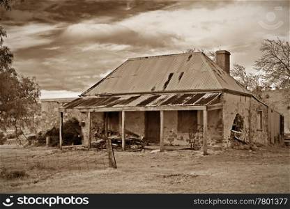 great image of old farmhouse ruins in sepia