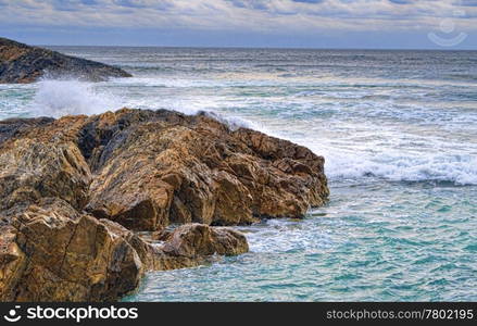 great image of rocks and waves on the coast