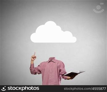 Great mind. Businessman with cloud instead of head holding book in hand