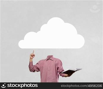 Great mind. Businessman with cloud instead of head holding book in hand