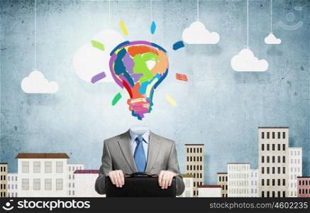 Great mind. Businessman with light bulb instead of head