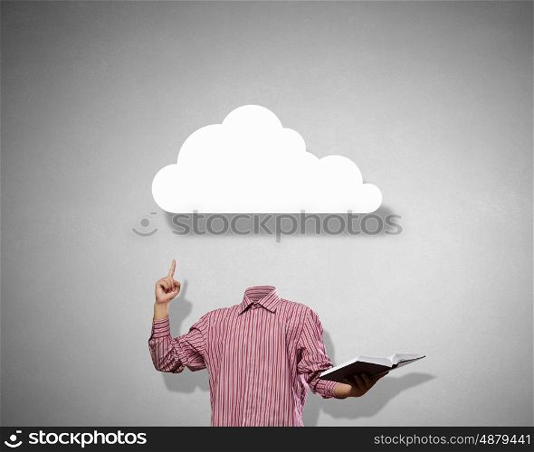 Great mind. Businessman without head holding book in hand