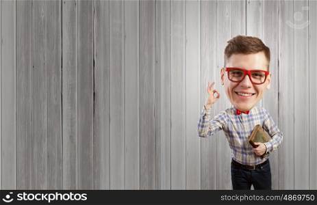 Great mind. Funny big headed man in glasses with book in hands showing ok gesture