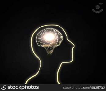 Great mind. Human head silhoutte and glowing brain inside