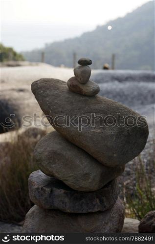 Great pyramid of stones on the background, of wild nature.