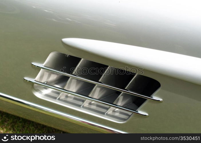 great silver oldtimer vintage car detail: air inlet