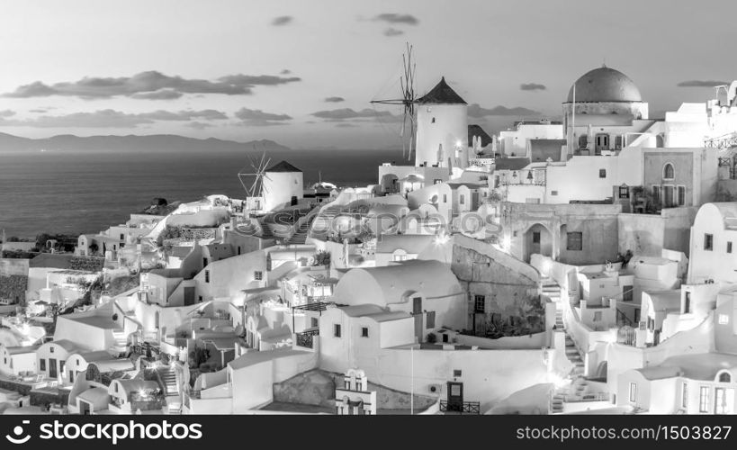 Great twilight view of Santorini island. Sunset on the famous Oia city, Greece, Europe