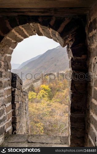 Great Wall of China at Mutianyu viewed through doorway of watchtower. Great Wall of China at Mutianyu