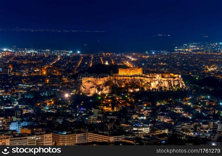Greece. Athens. Summer night. Illuminated city and acropolis. Aerial view. Athens and the Acropolis at Night