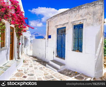 Greece, Cyclades. Beautiful Lefkes traditional greek village in Paros island. typical whitewashed houses and floral narrow streets.