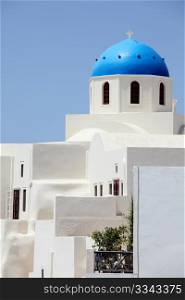 Greece, Cyclades Islands, Santorini, Oia, view of a church with blue dome.. View of church with blue dome. Oia, Santorini, Greece.