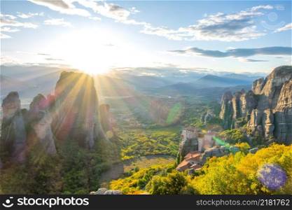 Greece. Kalambaka. Summer sunset in Meteora. A monastery on the rocks, listed by UNESCO. Greek Rocky Monastery at Sunset