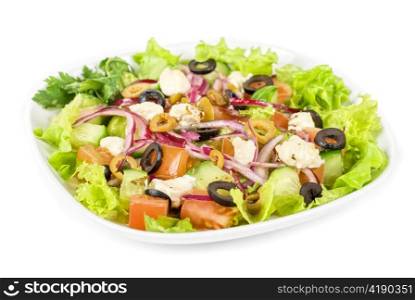 greece salad at plate isolated on a white