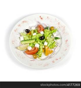 Greece salad dish isolated on a white background