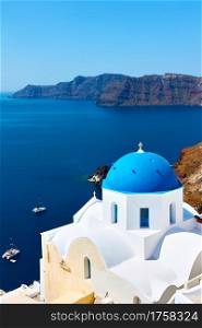 Greece, Santorini Island. Scenic view with white church on the coast on the high coast by the sea. Greek landscape