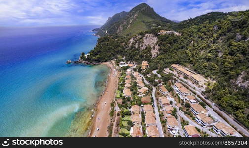Greece summer holidays. Best scenic beaches of Corfu island - aerial panoramic view of Glyfada beach and village in western part
